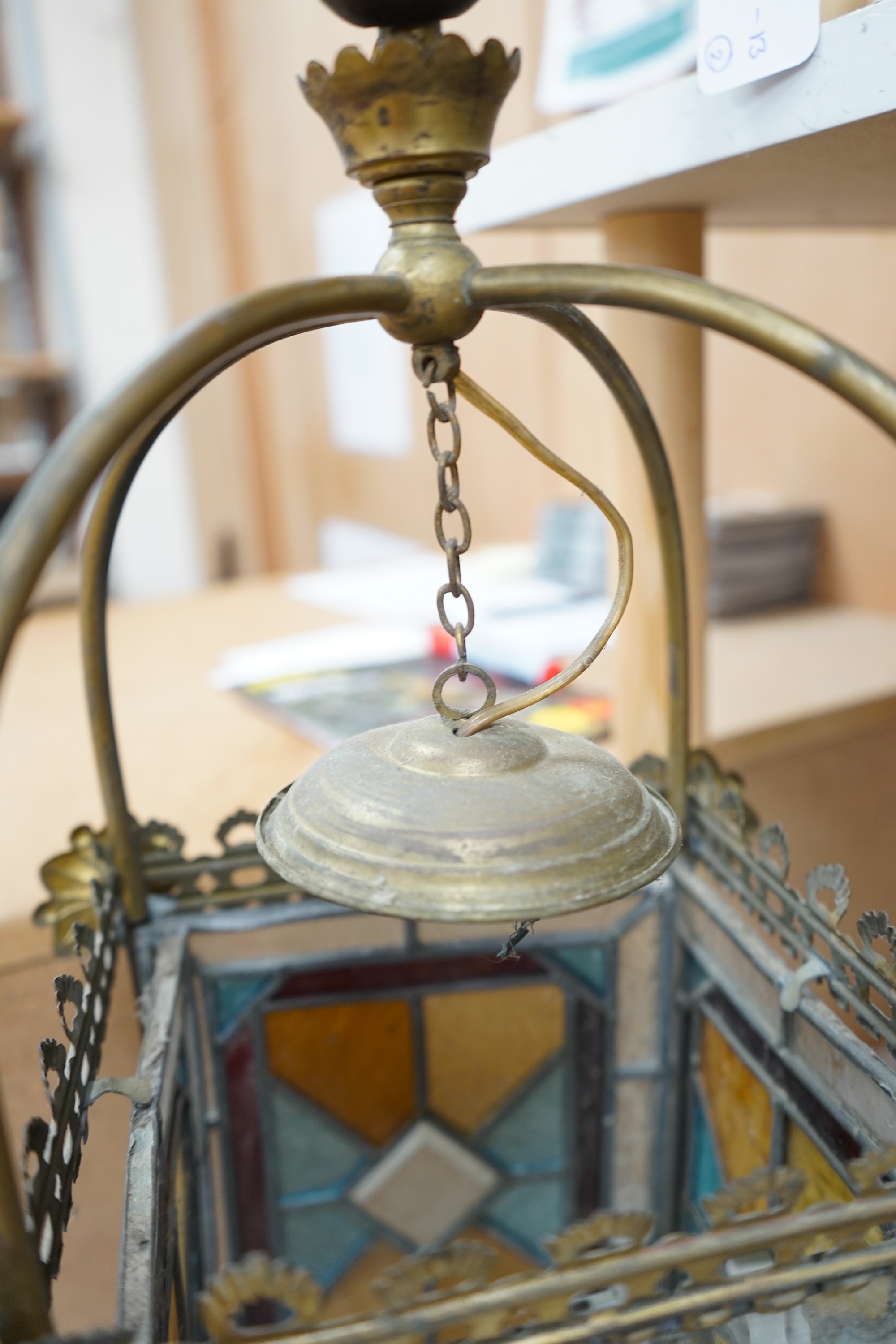 A Victorian coloured leaded glass and brass hall lantern, 65cm high. Condition - fair.